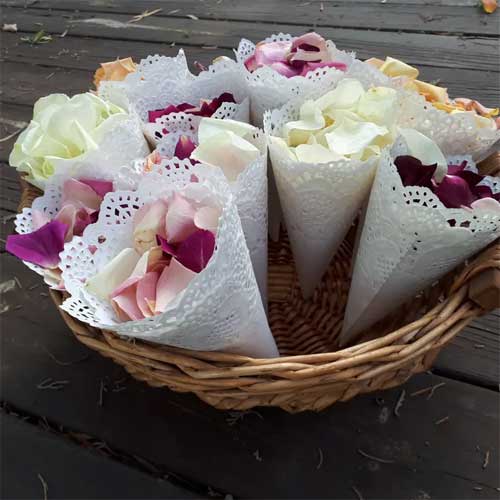 Toss cones with freeze dried rose petals