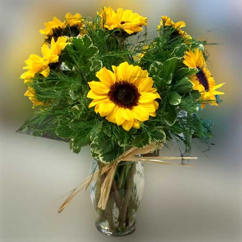 vase of mini sunflowers