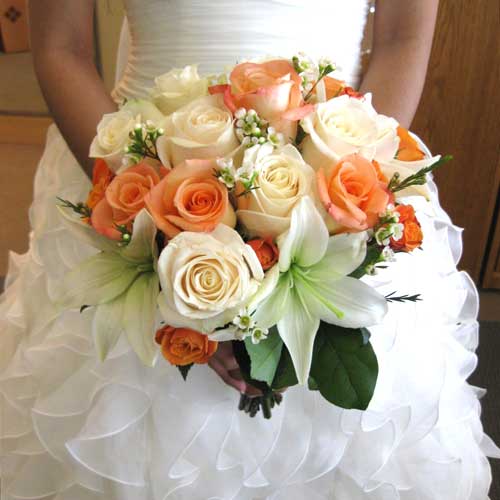 ivory and orange rose bridal bouquet